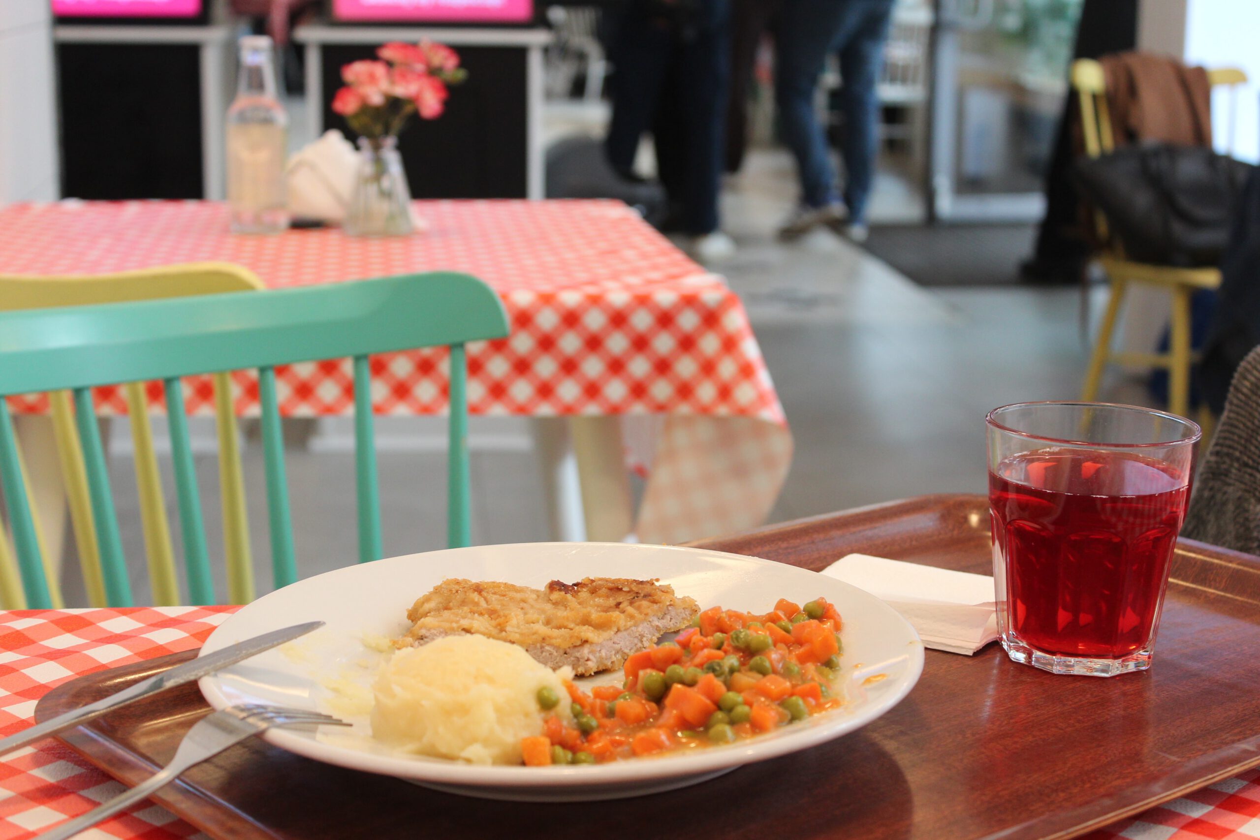 A meal sitting ready to be eaten at a cafe table