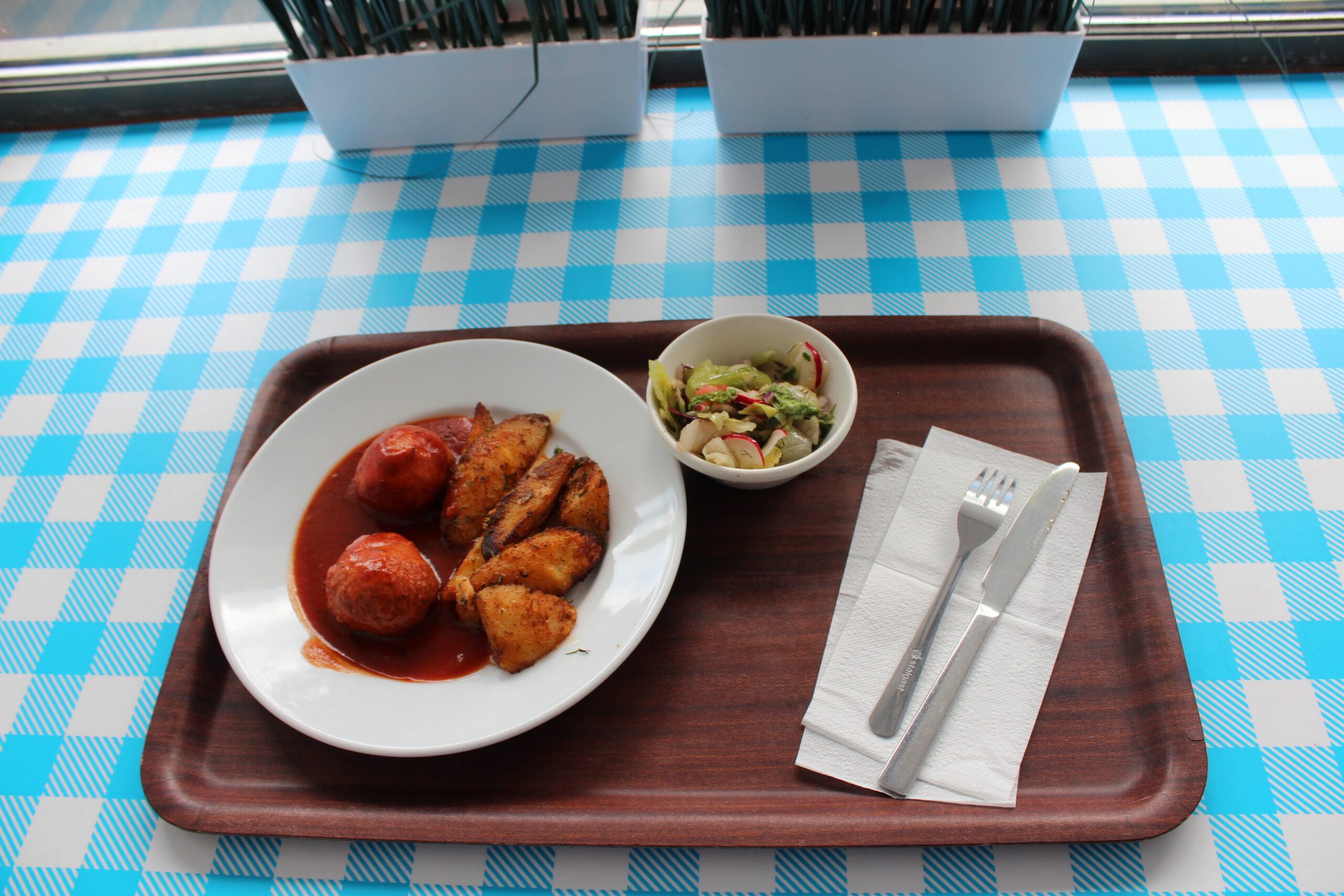 Tasty meal ready to eat sitting on a table by the window in a cafe
