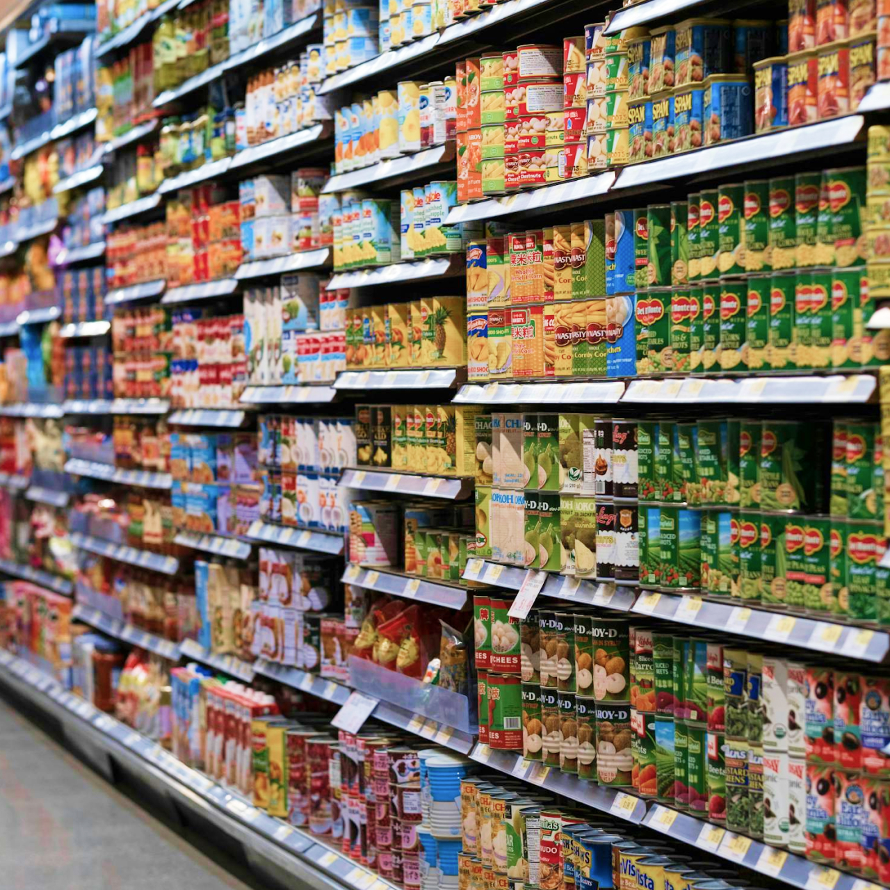 Shop with shelves stocked with canned food